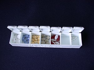 Pill box with pills.JPG