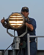 Seaman send Morse code signals.jpg